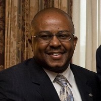 Professional headshot of Floyd White