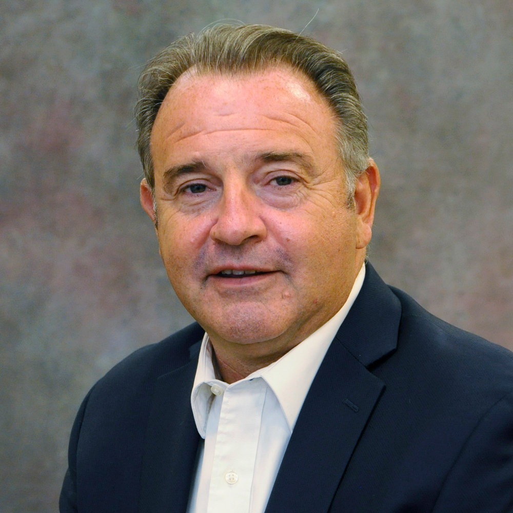 Professional headshot of James Curtin